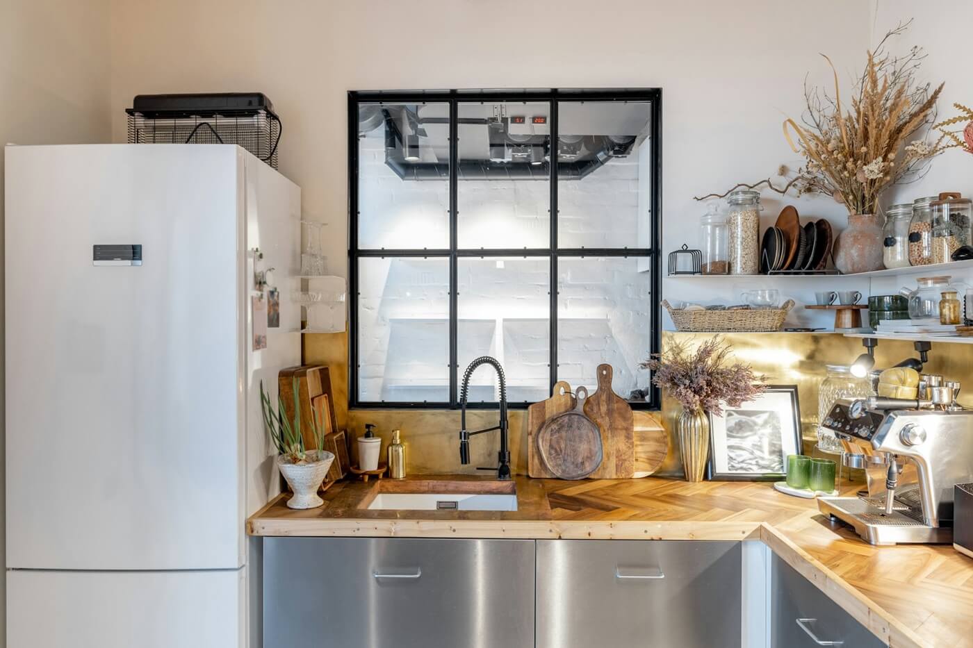 kitchen-interior-with-loft-window-in-modern-industrial-style-VRTXBLH