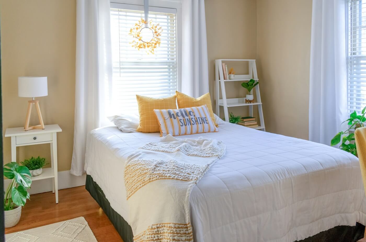 stylish-small-bedroom-decorated-in-yellow-and-white-KMLW8UW