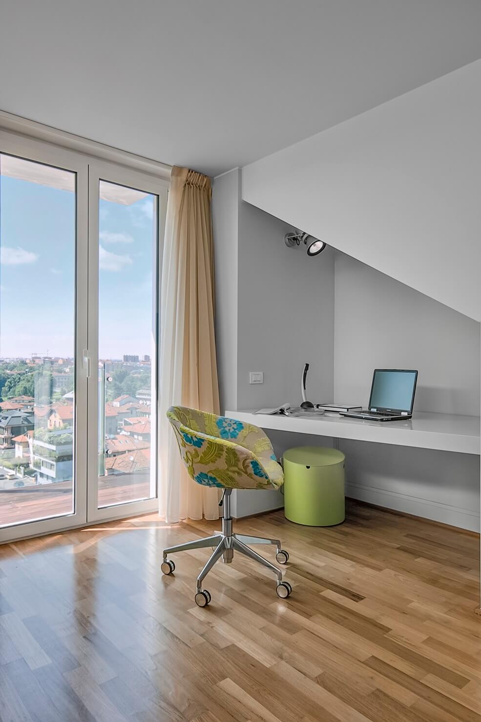 desk-and-armchair-near-to-french-window-in-the-chi-2UEQBRY