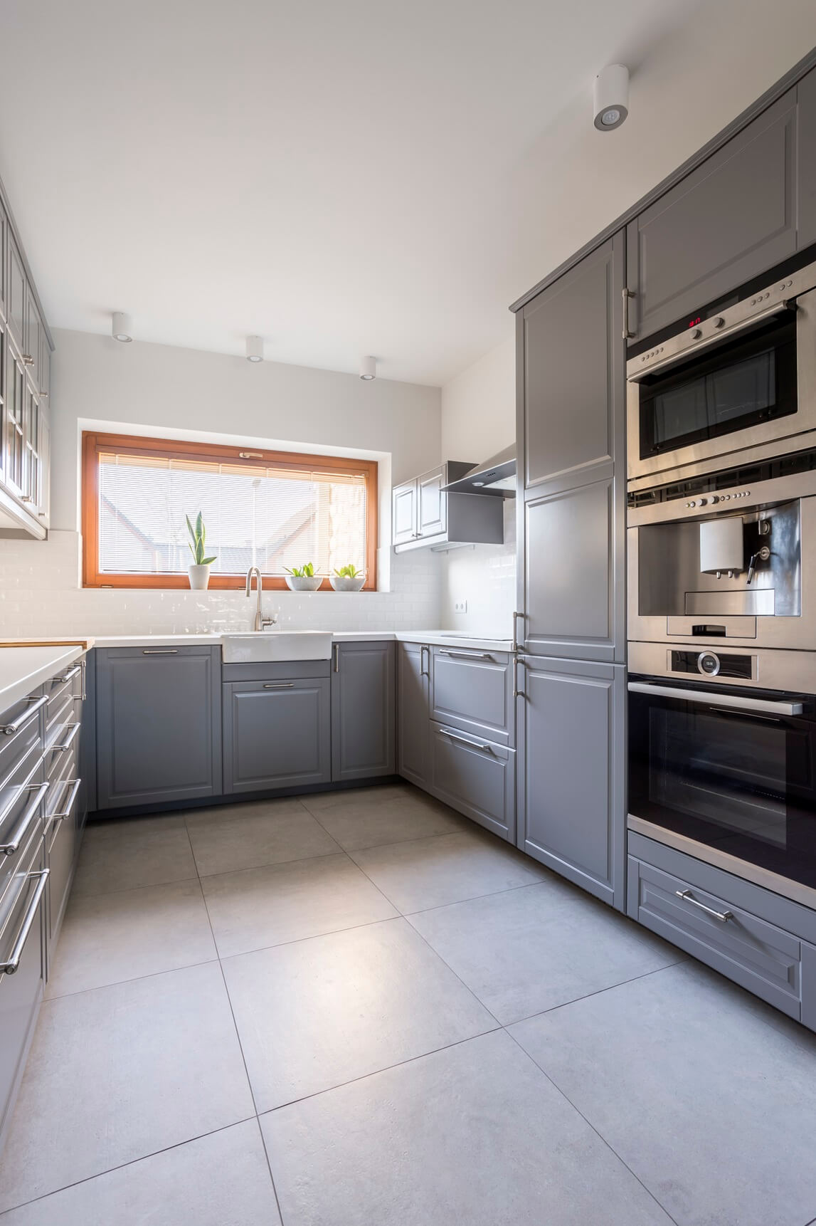 modern-kitchen-with-grey-furniture-PZDGMFV